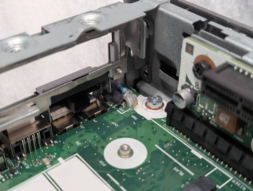 Janky resistor soldered inside the thin client